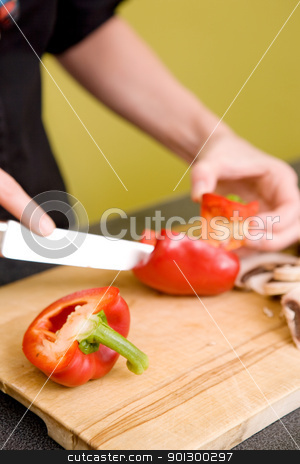 To use this stock image in your creative project, please select the size you need over to the right and click the "Add to Cart" button.
Your downloaded image will come with the Cutcaster watermark removed so don’t worry about the watermark you see on this page. Female Slicing a Red Pepper stock photo, A detail image of a female hand slicing peppers for a pizza. Shallow depth of field is used to isolate the subject while focus is on the red pepper in the foreground. by Tyler Olson