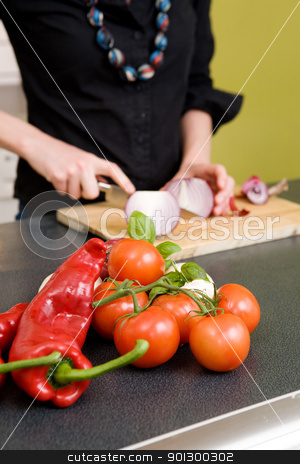 To use this stock image in your creative project, please select the size you need over to the right and click the "Add to Cart" button.
Your downloaded image will come with the Cutcaster watermark removed so don’t worry about the watermark you see on this page. Tomatoes and Chillies stock photo, Tomatoes and a Chillie pepper sitting on the couter waiting to be sliced. - Shallow depth of field with ocus is on the vegetables in the foreground of the images. by Tyler Olson