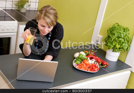 To use this stock image in your creative project, please select the size you need over to the right and click the "Add to Cart" button.
Your downloaded image will come with the Cutcaster watermark removed so don’t worry about the watermark you see on this page. Online Lunch stock photo, A young female surfs the internet while enjoying a light healthy snack of vegetables and juice. by Tyler Olson