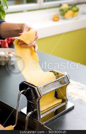 To use this stock image in your creative project, please select the size you need over to the right and click the "Add to Cart" button.
Your downloaded image will come with the Cutcaster watermark removed so don’t worry about the watermark you see on this page. Pasta Making Detail stock photo, A detail - abstract image of a manual pasta machine by Tyler Olson