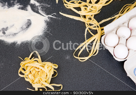 To use this stock image in your creative project, please select the size you need over to the right and click the "Add to Cart" button.
Your downloaded image will come with the Cutcaster watermark removed so don’t worry about the watermark you see on this page. Fresh Fettuccine Abstract stock photo, Homemade Fettuccine and ingredients by Tyler Olson