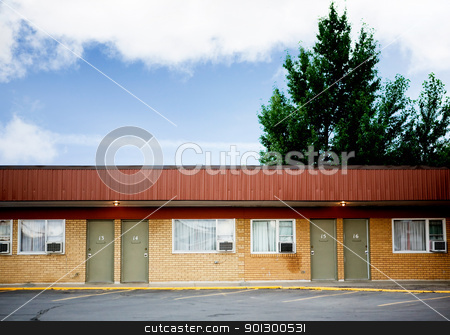 To use this stock image in your creative project, please select the size you need over to the right and click the "Add to Cart" button.
Your downloaded image will come with the Cutcaster watermark removed so don’t worry about the watermark you see on this page. Old Hotel stock photo, An old retro hotel and parking lot by Tyler Olson