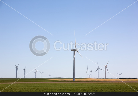 To use this stock image in your creative project, please select the size you need over to the right and click the "Add to Cart" button.
Your downloaded image will come with the Cutcaster watermark removed so don’t worry about the watermark you see on this page. Wind Turbine Farm stock photo, A wind turbine farm on the beautiful prairies by Tyler Olson