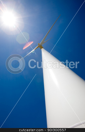 To use this stock image in your creative project, please select the size you need over to the right and click the "Add to Cart" button.
Your downloaded image will come with the Cutcaster watermark removed so don’t worry about the watermark you see on this page. Sun and Wind stock photo, A wind turbine and the sun against a deep blue sky. Image has heavy lens flare from the sun. by Tyler Olson