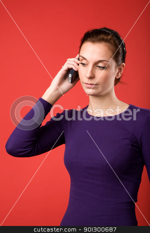 To use this stock image in your creative project, please select the size you need over to the right and click the "Add to Cart" button.
Your downloaded image will come with the Cutcaster watermark removed so don’t worry about the watermark you see on this page. Cell Phone Woman stock photo, A casual portrait of a brunette caucasian female talking on a cell phone with a red background by Tyler Olson