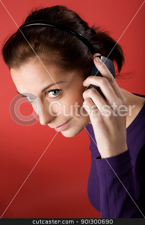 To use this stock image in your creative project, please select the size you need over to the right and click the "Add to Cart" button.
Your downloaded image will come with the Cutcaster watermark removed so don’t worry about the watermark you see on this page. Talking on Cell Phone stock photo, A young woman talking on the cell phone. by Tyler Olson