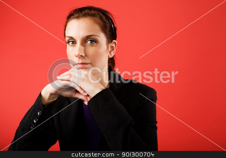 To use this stock image in your creative project, please select the size you need over to the right and click the "Add to Cart" button.
Your downloaded image will come with the Cutcaster watermark removed so don’t worry about the watermark you see on this page. Confident Business Woman stock photo, A young content business woman looks at the camera by Tyler Olson