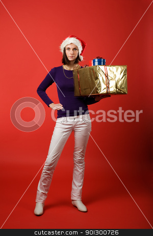 To use this stock image in your creative project, please select the size you need over to the right and click the "Add to Cart" button.
Your downloaded image will come with the Cutcaster watermark removed so don’t worry about the watermark you see on this page. Christmas Present stock photo, A young woman with a present isolated on red by Tyler Olson