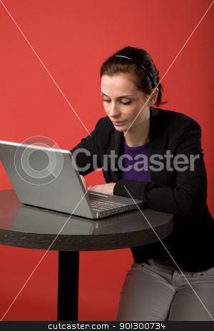 To use this stock image in your creative project, please select the size you need over to the right and click the "Add to Cart" button.
Your downloaded image will come with the Cutcaster watermark removed so don’t worry about the watermark you see on this page. Young Woman using Laptop stock photo, A young woman working on a latptop computer by Tyler Olson