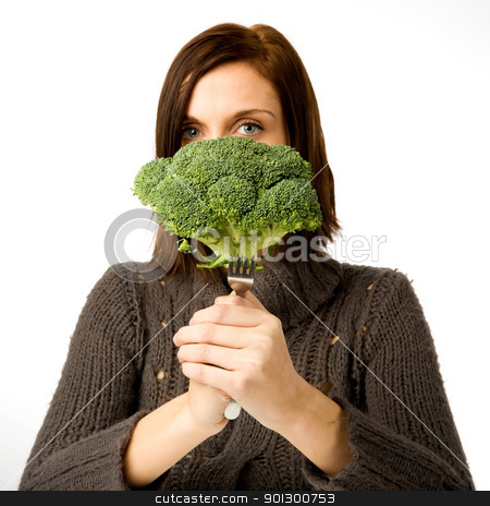 To use this stock image in your creative project, please select the size you need over to the right and click the "Add to Cart" button.
Your downloaded image will come with the Cutcaster watermark removed so don’t worry about the watermark you see on this page. Broccoli stock photo, A woman ready to eat broccoli by Tyler Olson