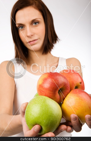 To use this stock image in your creative project, please select the size you need over to the right and click the "Add to Cart" button.
Your downloaded image will come with the Cutcaster watermark removed so don’t worry about the watermark you see on this page. Apples stock photo, A young woman holding a bunch of apples by Tyler Olson