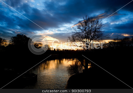 To use this stock image in your creative project, please select the size you need over to the right and click the "Add to Cart" button.
Your downloaded image will come with the Cutcaster watermark removed so don’t worry about the watermark you see on this page. Lake Sunset stock photo, A dramatic sunset over a small lake by Tyler Olson