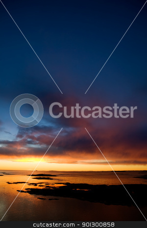To use this stock image in your creative project, please select the size you need over to the right and click the "Add to Cart" button.
Your downloaded image will come with the Cutcaster watermark removed so don’t worry about the watermark you see on this page. Ocean Sunset stock photo, Beautiful coastal Landsacpe on the very outside of the Oslo Fjord near Fredrikstad, Norway. by Tyler Olson