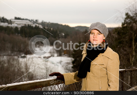 To use this stock image in your creative project, please select the size you need over to the right and click the "Add to Cart" button.
Your downloaded image will come with the Cutcaster watermark removed so don’t worry about the watermark you see on this page. Young Woman in the winter stock photo, A young woman outside in winter by Tyler Olson