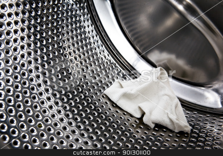 To use this stock image in your creative project, please select the size you need over to the right and click the "Add to Cart" button.
Your downloaded image will come with the Cutcaster watermark removed so don’t worry about the watermark you see on this page. Sock in Washer stock photo, A lost sock is found in the washer by Tyler Olson
