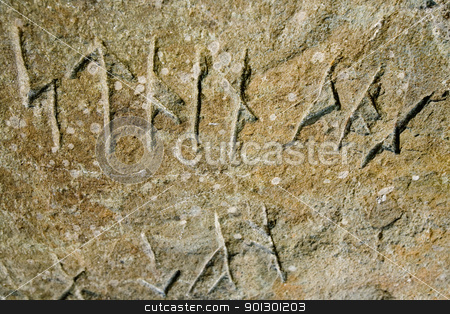 To use this stock image in your creative project, please select the size you need over to the right and click the "Add to Cart" button.
Your downloaded image will come with the Cutcaster watermark removed so don’t worry about the watermark you see on this page. Viking Rune Inscription stock photo, Viking runes inscribed in a stone by Tyler Olson