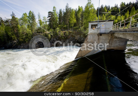 To use this stock image in your creative project, please select the size you need over to the right and click the "Add to Cart" button.
Your downloaded image will come with the Cutcaster watermark removed so don’t worry about the watermark you see on this page. Hydro Electric stock photo, A hydro electric plant on a river by Tyler Olson