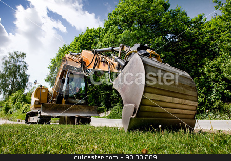 To use this stock image in your creative project, please select the size you need over to the right and click the "Add to Cart" button.
Your downloaded image will come with the Cutcaster watermark removed so don’t worry about the watermark you see on this page. Backhoe stock photo, A backhoe sitting on grass by Tyler Olson