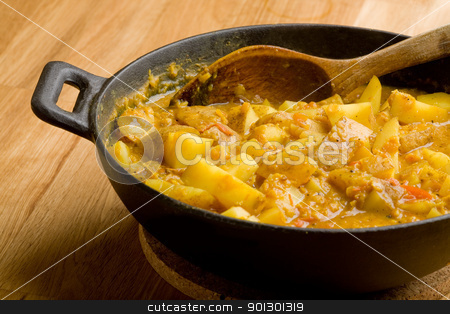 To use this stock image in your creative project, please select the size you need over to the right and click the "Add to Cart" button.
Your downloaded image will come with the Cutcaster watermark removed so don’t worry about the watermark you see on this page. Potato Curry Dish stock photo, An indian vegetarian curry - Dhaal Aloo by Tyler Olson