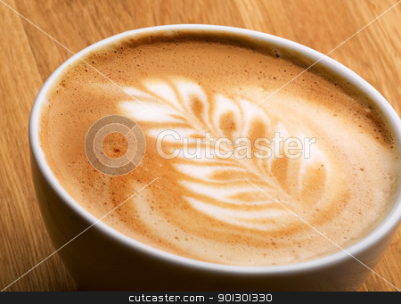 To use this stock image in your creative project, please select the size you need over to the right and click the "Add to Cart" button.
Your downloaded image will come with the Cutcaster watermark removed so don’t worry about the watermark you see on this page. Latte Art stock photo, A latte in a bowl with latte art by Tyler Olson
