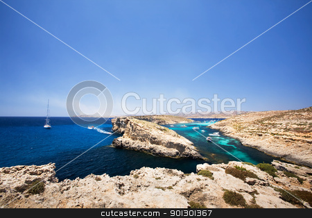 To use this stock image in your creative project, please select the size you need over to the right and click the "Add to Cart" button.
Your downloaded image will come with the Cutcaster watermark removed so don’t worry about the watermark you see on this page. Comino and Gozo Island stock photo, Comino and Gozo island in malta by Tyler Olson