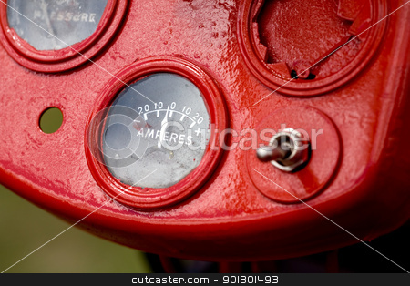 To use this stock image in your creative project, please select the size you need over to the right and click the "Add to Cart" button.
Your downloaded image will come with the Cutcaster watermark removed so don’t worry about the watermark you see on this page. Old Amperes stock photo, Retro tractor dials - focus on the amperes gauge by Tyler Olson