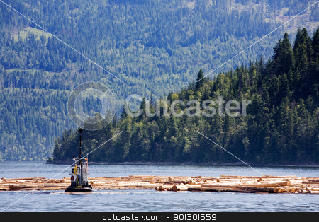 To use this stock image in your creative project, please select the size you need over to the right and click the "Add to Cart" button.
Your downloaded image will come with the Cutcaster watermark removed so don’t worry about the watermark you see on this page. Coastal Logging stock photo, A logging boat on the coast by Tyler Olson