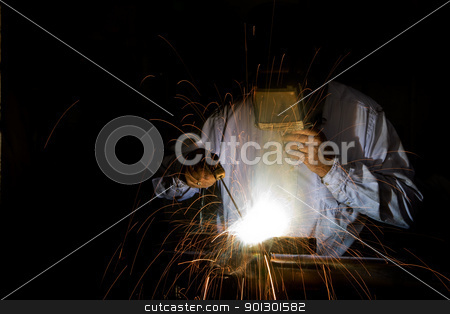 To use this stock image in your creative project, please select the size you need over to the right and click the "Add to Cart" button.
Your downloaded image will come with the Cutcaster watermark removed so don’t worry about the watermark you see on this page. Welding stock photo, A male welding metal by Tyler Olson