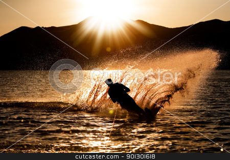 To use this stock image in your creative project, please select the size you need over to the right and click the "Add to Cart" button.
Your downloaded image will come with the Cutcaster watermark removed so don’t worry about the watermark you see on this page. Sunset Waterski stock photo, A male waterskiing in the evening sunset by Tyler Olson