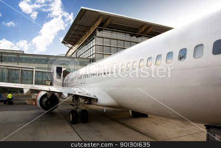 To use this stock image in your creative project, please select the size you need over to the right and click the "Add to Cart" button.
Your downloaded image will come with the Cutcaster watermark removed so don’t worry about the watermark you see on this page. Airplane Terminal stock photo, An airplane at a terminal gate ready for boarding by Tyler Olson