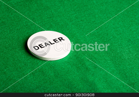 To use this stock image in your creative project, please select the size you need over to the right and click the "Add to Cart" button.
Your downloaded image will come with the Cutcaster watermark removed so don’t worry about the watermark you see on this page. Dealer Chip stock photo, A dealer chip, part of a home poker game by Tyler Olson