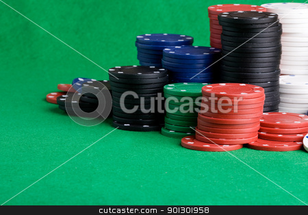 To use this stock image in your creative project, please select the size you need over to the right and click the "Add to Cart" button.
Your downloaded image will come with the Cutcaster watermark removed so don’t worry about the watermark you see on this page. Casino Chips stock photo, Casino Chips on green felt background by Tyler Olson