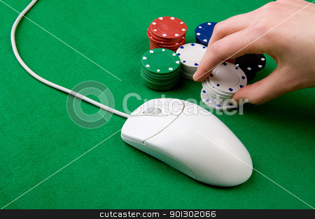 To use this stock image in your creative project, please select the size you need over to the right and click the "Add to Cart" button.
Your downloaded image will come with the Cutcaster watermark removed so don’t worry about the watermark you see on this page. Online Gambling stock photo, An online gambling concept - computer mouse, hand and casino chips by Tyler Olson