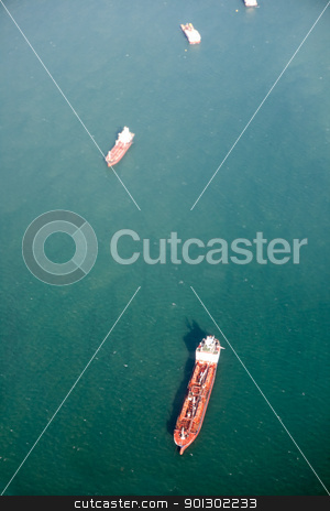 To use this stock image in your creative project, please select the size you need over to the right and click the "Add to Cart" button.
Your downloaded image will come with the Cutcaster watermark removed so don’t worry about the watermark you see on this page. Ocean Tanker Aerial stock photo, An ocean tanker on the open sea by Tyler Olson