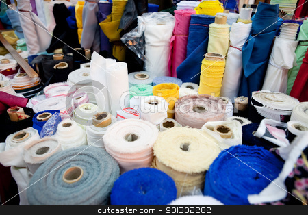 To use this stock image in your creative project, please select the size you need over to the right and click the "Add to Cart" button.
Your downloaded image will come with the Cutcaster watermark removed so don’t worry about the watermark you see on this page. Material Background stock photo, An abstract background of various rolls of cloth by Tyler Olson