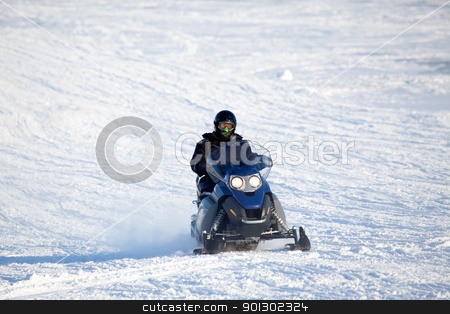 To use this stock image in your creative project, please select the size you need over to the right and click the "Add to Cart" button.
Your downloaded image will come with the Cutcaster watermark removed so don’t worry about the watermark you see on this page. Snowmobile stock photo, A snowmobile isolated against a winter snow landscape by Tyler Olson