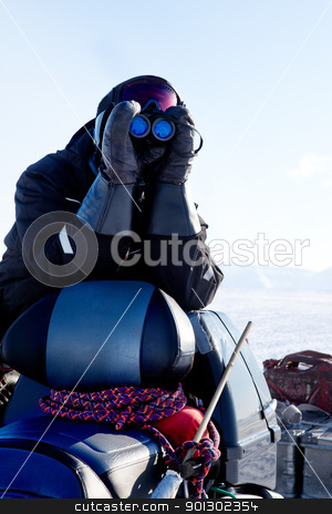 To use this stock image in your creative project, please select the size you need over to the right and click the "Add to Cart" button.
Your downloaded image will come with the Cutcaster watermark removed so don’t worry about the watermark you see on this page. Winter Adventure Scout stock photo, A winter adventure guide scouting the landscape for danger by Tyler Olson