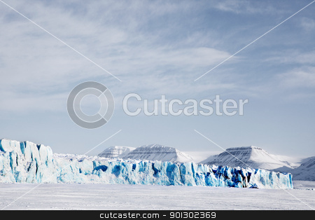 To use this stock image in your creative project, please select the size you need over to the right and click the "Add to Cart" button.
Your downloaded image will come with the Cutcaster watermark removed so don’t worry about the watermark you see on this page. Glacier Landscape stock photo, A glacier landscape during winter on the island of Spitsbergen, Svalbard, Norway by Tyler Olson