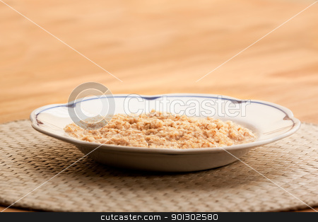 To use this stock image in your creative project, please select the size you need over to the right and click the "Add to Cart" button.
Your downloaded image will come with the Cutcaster watermark removed so don’t worry about the watermark you see on this page. Porridge stock photo, A bowl of porridge on a wooden table. by Tyler Olson