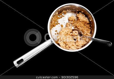 To use this stock image in your creative project, please select the size you need over to the right and click the "Add to Cart" button.
Your downloaded image will come with the Cutcaster watermark removed so don’t worry about the watermark you see on this page. Cold Porridge Pot stock photo, A pot of old cold porridge isolated on black by Tyler Olson