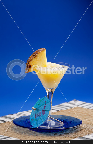 To use this stock image in your creative project, please select the size you need over to the right and click the "Add to Cart" button.
Your downloaded image will come with the Cutcaster watermark removed so don’t worry about the watermark you see on this page. Pina Colada Smoothie stock photo, A refreshing summer drunk - pina colada over a blue background by Tyler Olson