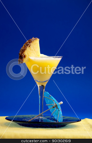 To use this stock image in your creative project, please select the size you need over to the right and click the "Add to Cart" button.
Your downloaded image will come with the Cutcaster watermark removed so don’t worry about the watermark you see on this page. Pina Colada stock photo, A refreshing summer drunk - pina colada over a blue background by Tyler Olson