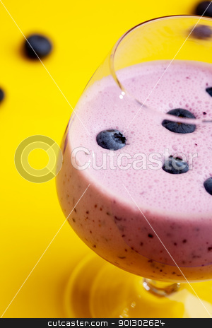 To use this stock image in your creative project, please select the size you need over to the right and click the "Add to Cart" button.
Your downloaded image will come with the Cutcaster watermark removed so don’t worry about the watermark you see on this page. Blueberry Smoothie stock photo, A delicious blueberry smoothie isolated on yellow by Tyler Olson