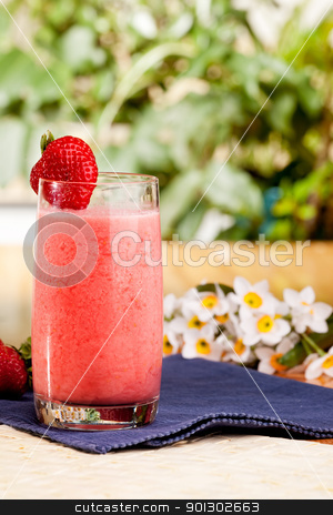 To use this stock image in your creative project, please select the size you need over to the right and click the "Add to Cart" button.
Your downloaded image will come with the Cutcaster watermark removed so don’t worry about the watermark you see on this page. Strawberry Smoothie stock photo, A fresh summer strawberry drink in an outdoor setting by Tyler Olson