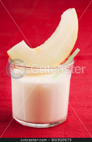 To use this stock image in your creative project, please select the size you need over to the right and click the "Add to Cart" button.
Your downloaded image will come with the Cutcaster watermark removed so don’t worry about the watermark you see on this page. Melon Smoothie stock photo, A sweet melon smoothie on a red cloth by Tyler Olson