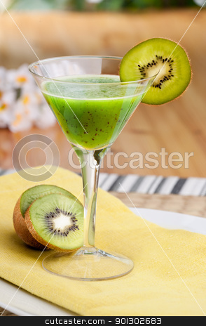 To use this stock image in your creative project, please select the size you need over to the right and click the "Add to Cart" button.
Your downloaded image will come with the Cutcaster watermark removed so don’t worry about the watermark you see on this page. Kiwi Fruit Punch stock photo, A kiwi based fruit drink in a martini glass by Tyler Olson