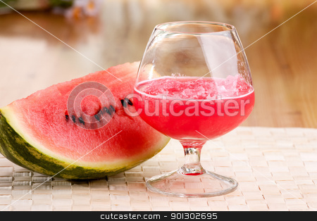 To use this stock image in your creative project, please select the size you need over to the right and click the "Add to Cart" button.
Your downloaded image will come with the Cutcaster watermark removed so don’t worry about the watermark you see on this page. Watermelon Drink stock photo, A red watermelon drink on a picnic table by Tyler Olson