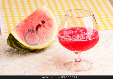 To use this stock image in your creative project, please select the size you need over to the right and click the "Add to Cart" button.
Your downloaded image will come with the Cutcaster watermark removed so don’t worry about the watermark you see on this page. Watermelon Juice stock photo, A red watermelon drink on a picnic table by Tyler Olson