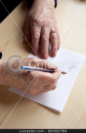 To use this stock image in your creative project, please select the size you need over to the right and click the "Add to Cart" button.
Your downloaded image will come with the Cutcaster watermark removed so don’t worry about the watermark you see on this page. Writing a Letter stock photo, An old pair of hands writing a letter by Tyler Olson