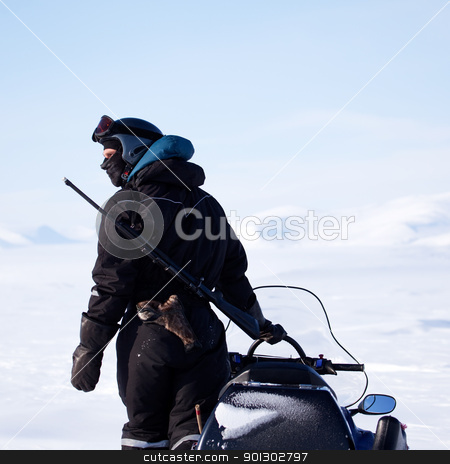 To use this stock image in your creative project, please select the size you need over to the right and click the "Add to Cart" button.
Your downloaded image will come with the Cutcaster watermark removed so don’t worry about the watermark you see on this page. Arctic Guide stock photo, An arctic guide equiped with a rifle, looks out on the horizon by Tyler Olson
